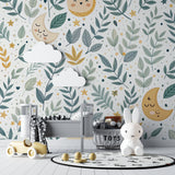 Botanical kids wallpaper with moons and stars in a modern playroom setting