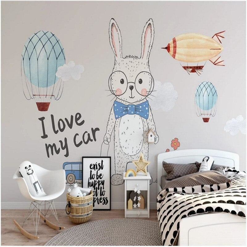 Kids bedroom featuring whimsical bunny wallpaper with floating balloons, perfect for storytelling corner