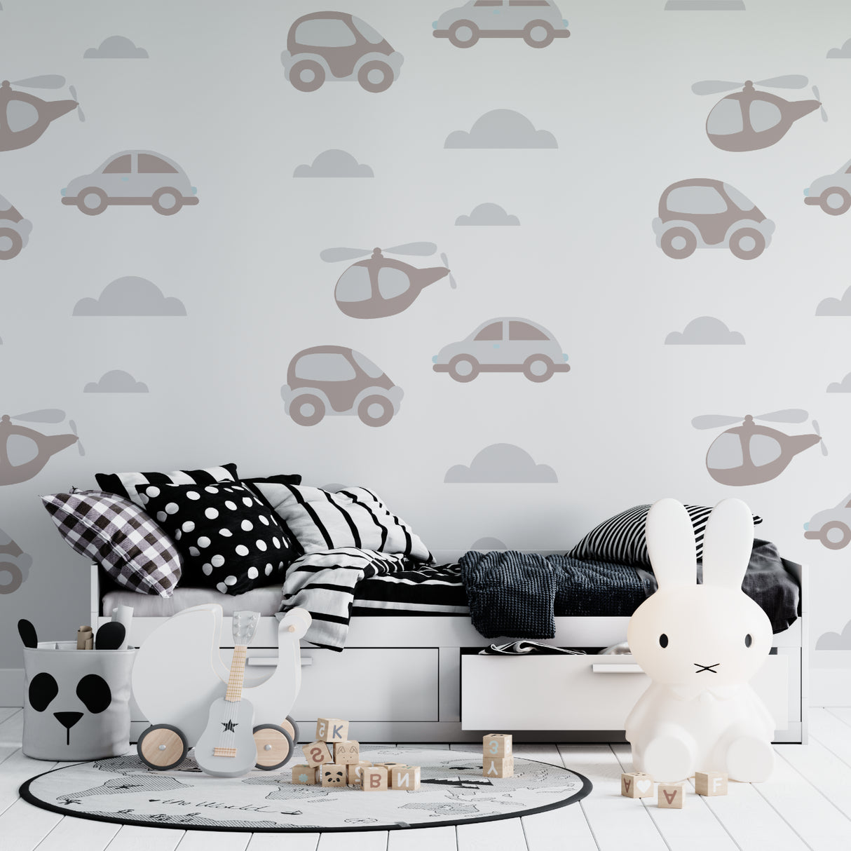Transport wallpaper in modern nursery with rocking chair and soft lighting showing cars and helicopters pattern