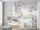 Transport themed wallpaper creating focal point in modern kids bedroom with minimal decor