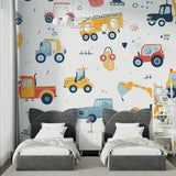 Construction themed wallpaper in a bright nursery showcasing playful vehicle patterns