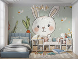 Nursery wall mural with bunny design styled with minimal furniture