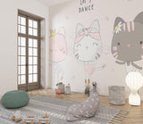 Kids room with dancing cats mural and pink accents