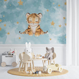 Baby tiger wall mural creating magical atmosphere in toddler's bedroom