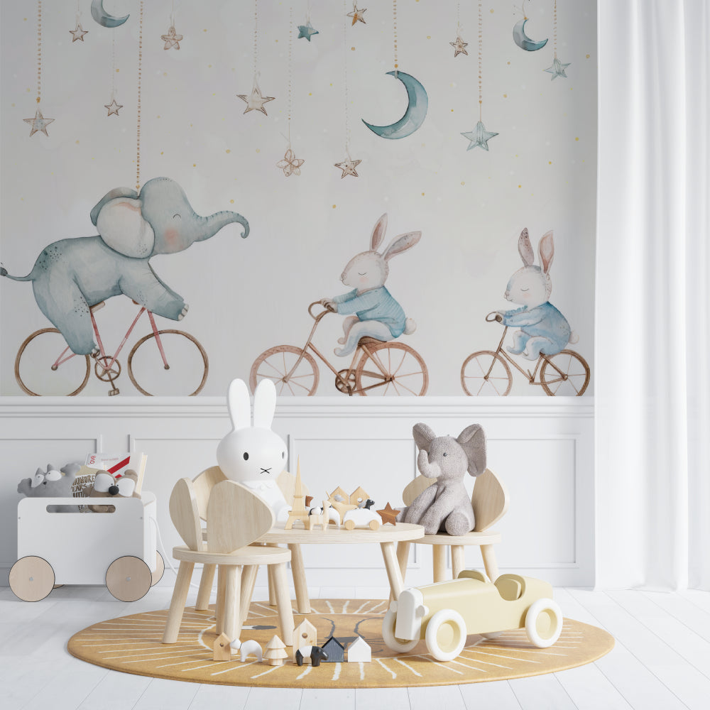 Baby room featuring elephant and bunny wallpaper with neutral decor and wooden crib