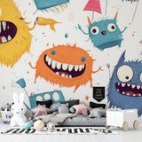Playful monster wall mural in a bright playroom setting with toys