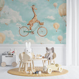 Playroom decorated with fun giraffe and hot air balloon wallpaper creating adventure vibes