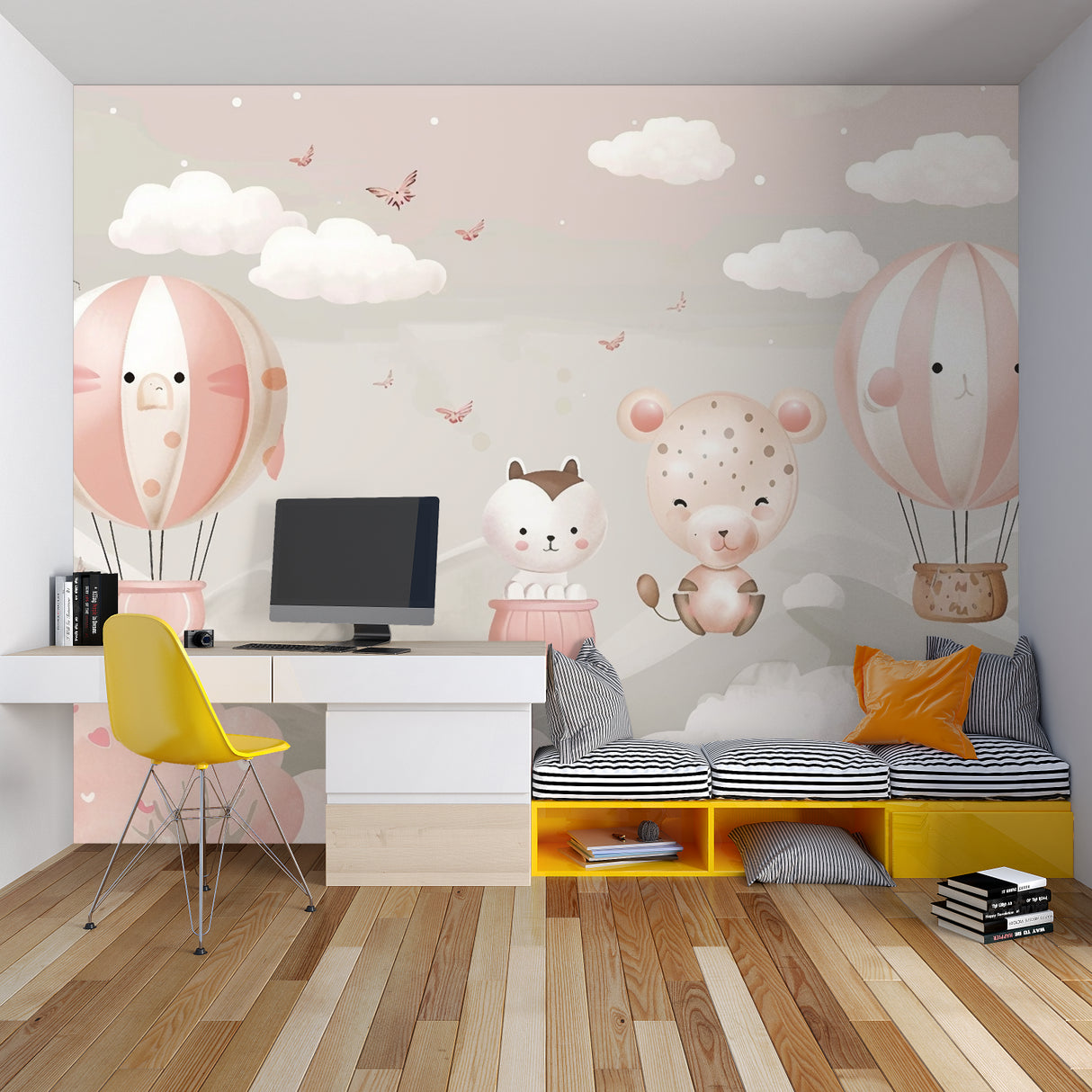 Children's bedroom featuring hot air balloon wallpaper mural with playful animals