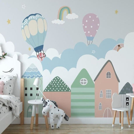 Hot air balloon nursery wallpaper in cozy bedroom with white furniture and soft lighting