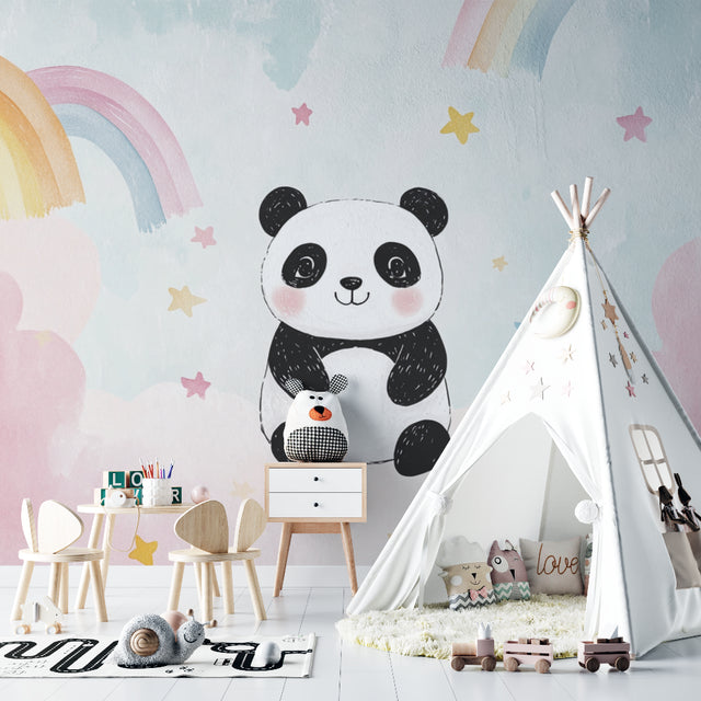 Sweet Panda nursery wallpaper with rainbows displayed in a bright nursery with white furniture