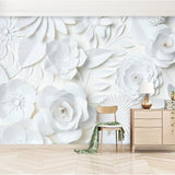 Pink castle wallpaper with mountains creating a magical atmosphere in a modern nursery with white furniture