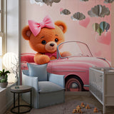 Pink teddy bear wall mural in toddler's reading nook with cozy chair