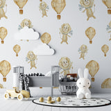 Kids bedroom accent wall with lion and hot air balloon mural in natural light