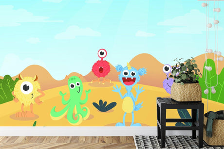 Monster wallpaper mural in bright kids playroom showing friendly characters against desert backdrop
