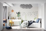 Playroom showcasing sage green dot pattern wallpaper with wooden toys and reading nook