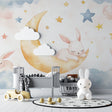 Bunny nursery wallpaper creating a cozy atmosphere in a modern white nursery with wooden crib