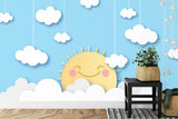 Sunny cloud wallpaper mural bringing warmth to a modern nursery with white furniture and natural accents