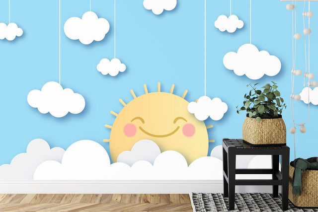 Sunny cloud wallpaper mural bringing warmth to a modern nursery with white furniture and natural accents
