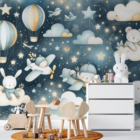 Dreamy nursery wallpaper with flying animals and stars shown in a cozy children's bedroom with soft lighting