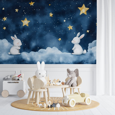 Bunny wallpaper with stars in a modern nursery with white furniture and soft lighting