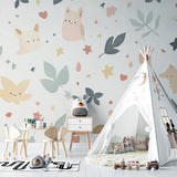 Kids room wallpaper with sweet animals displayed in a bright children's playroom