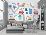 Playful transportation mural in a bright playroom showing buses and trams against white walls