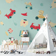 Vintage toy wallpaper creating a cozy atmosphere in a modern nursery with natural light