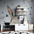 Watercolor Bunny Wallpaper in cozy nursery with white furniture and soft lighting