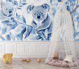 Blue koala wall mural creating a peaceful atmosphere in a child's reading nook