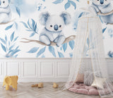 Koala nursery wallpaper bringing calm to a modern nursery with rocking chair and natural decor