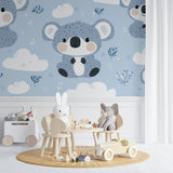 Koala and clouds wallpaper brings charm to a playroom setting