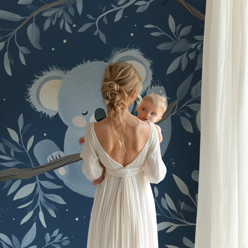 Koala nursery wallpaper creating a peaceful atmosphere in a modern nursery with neutral furniture