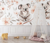 Cherry blossom koala wallpaper creating a peaceful atmosphere in a toddler's bedroom