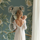 Sweet koala nursery wallpaper displayed in a reading nook with natural lighting