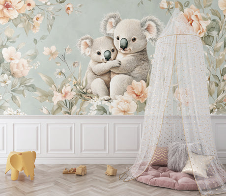 Koala nursery wallpaper in a modern white nursery with natural wooden furniture