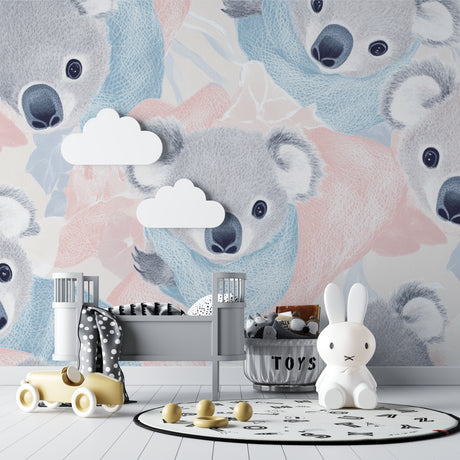 Koala nursery wallpaper in modern white nursery with wooden crib and rocking chair