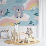 Baby koala wall mural creating a sweet atmosphere in a pink nursery with white crib