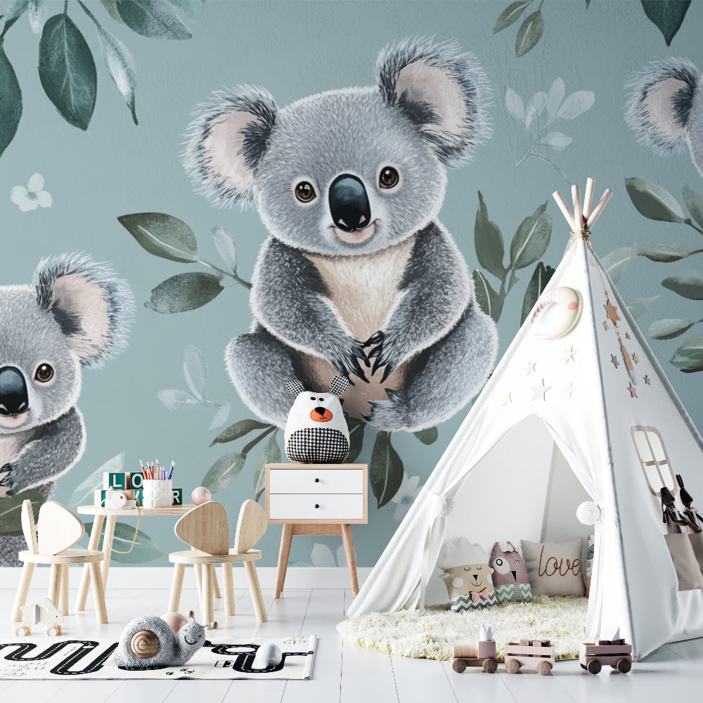 Nursery feature wall with koala wallpaper complementing sage green and white decor