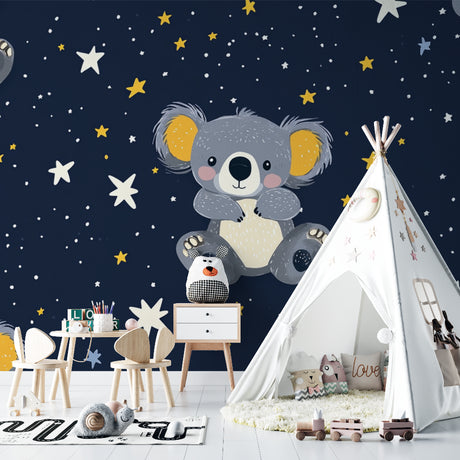 Koala nursery wallpaper in a modern baby room with soft lighting and wooden furniture