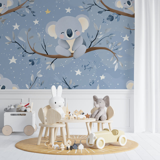 Koala nursery wallpaper creating a cozy atmosphere in a modern baby room with white furniture