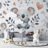 Sweet koala wall mural brightening a child's reading nook with soft lighting