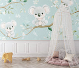 Toddler bedroom with sweet koala mural wallpaper creating a calm, nature-inspired atmosphere