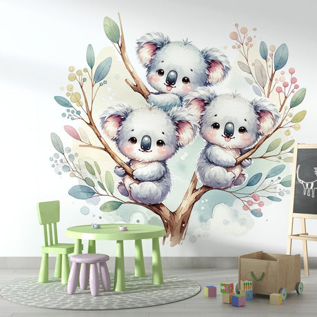 Sweet Koala wallpaper mural styled in a bright nursery with white furniture and soft pink accents