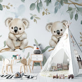 Koala and eucalyptus wallpaper bringing nature vibes to a modern playroom setting