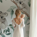 Eucalyptus koala mural brightening a modern playroom with natural lighting