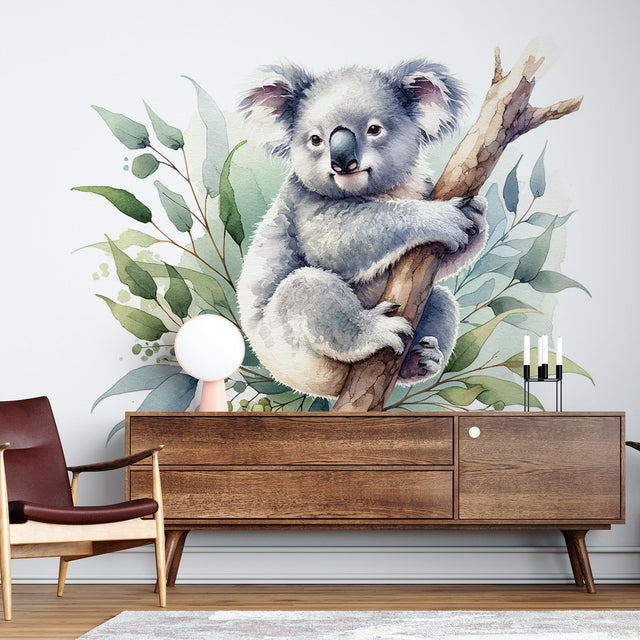 Koala wallpaper mural creating a peaceful atmosphere in a modern nursery with natural wood furniture