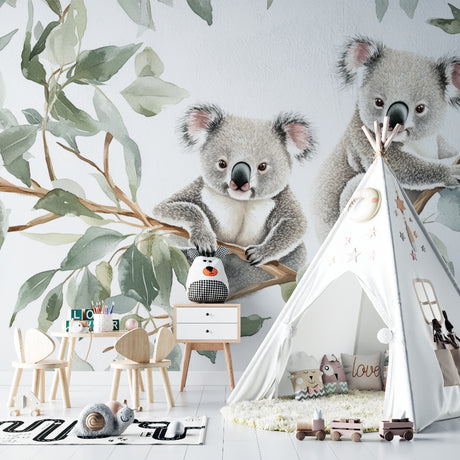 Koala wallpaper mural creating a cozy atmosphere in a modern nursery with natural light