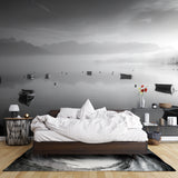 Monochrome lake wallpaper making a dramatic statement in a minimalist dining room
