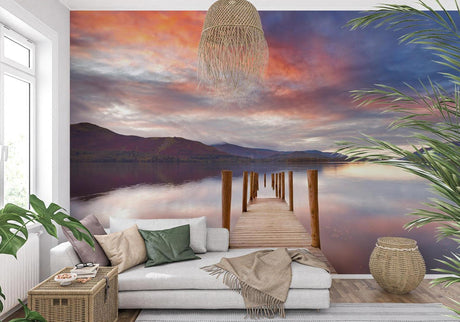 Lake landscape wallpaper creating depth in modern living room with minimal furniture