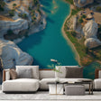 Turquoise river landscape wallpaper creating depth in a modern living room with white furniture and natural light